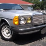 Front profile view of a 1983 Mercedes-Benz 300CDT Coupe, showcasing its classic design.