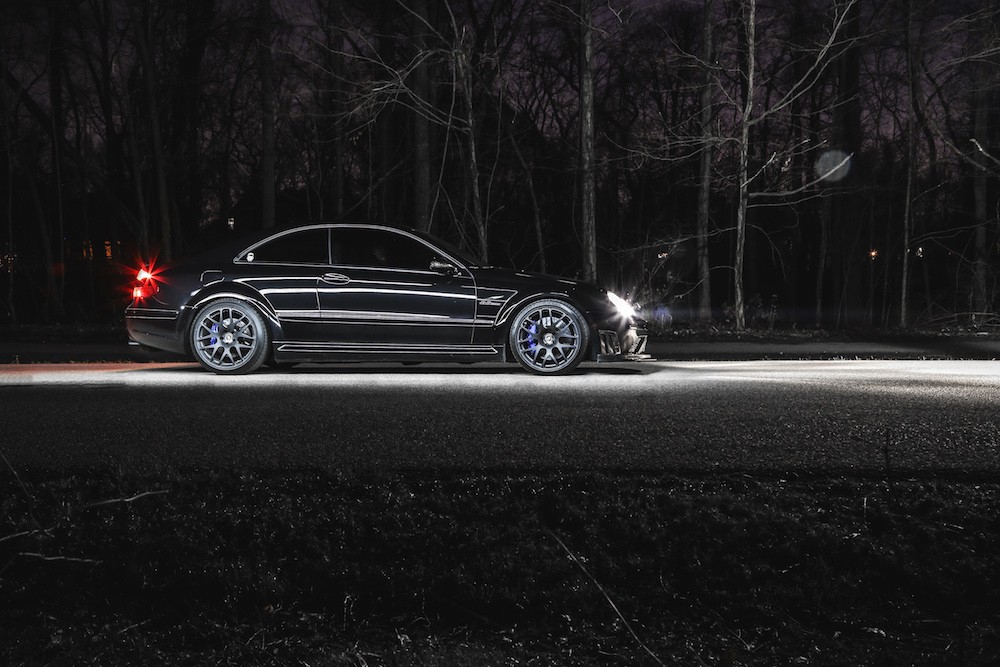 Mercedes-Benz CLK63 AMG Black Series front profile, showcasing its aggressive stance and carbon fiber accents