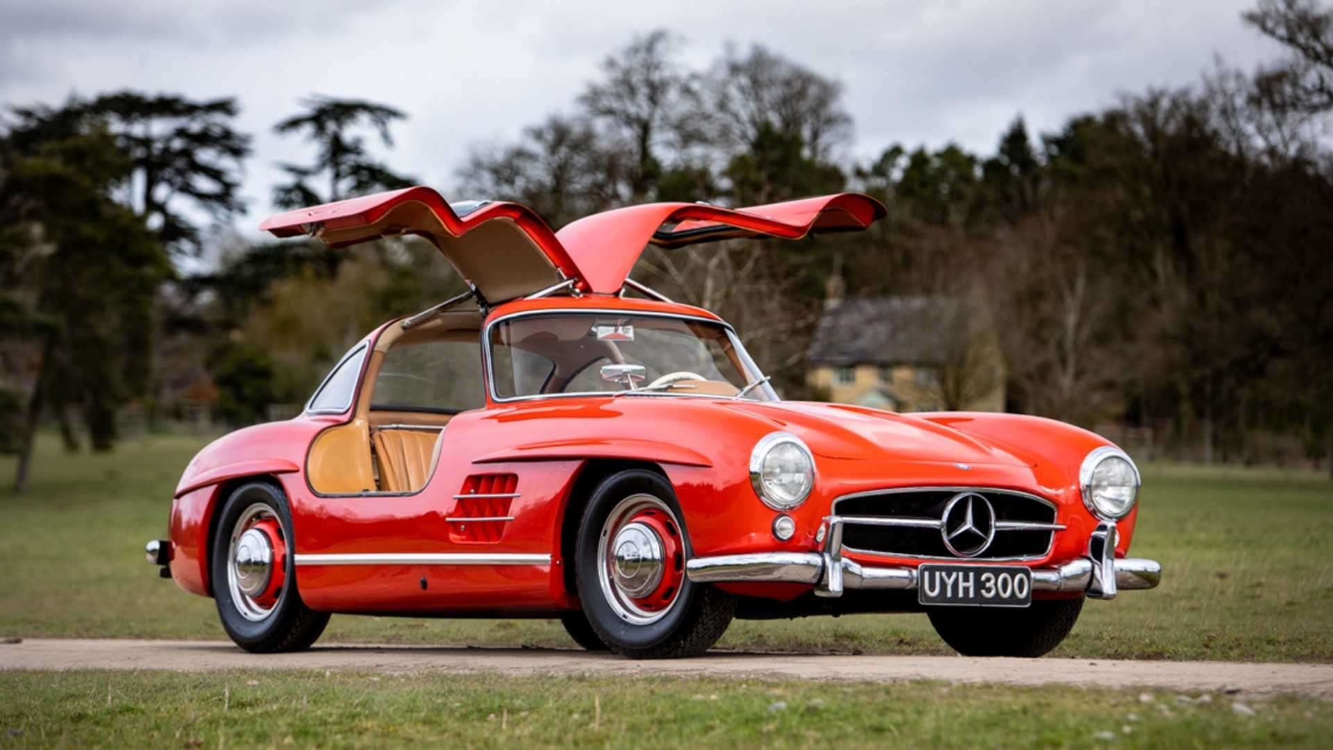 Stunning Fire Engine Red 1954 Mercedes-Benz 300SL Gullwing at Silverstone Auctions, a highly sought-after classic car for collectors