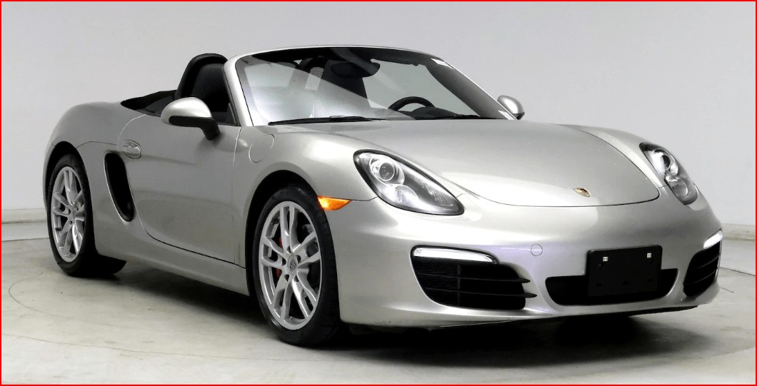 Porsche Boxster with top down, showcasing its convertible design