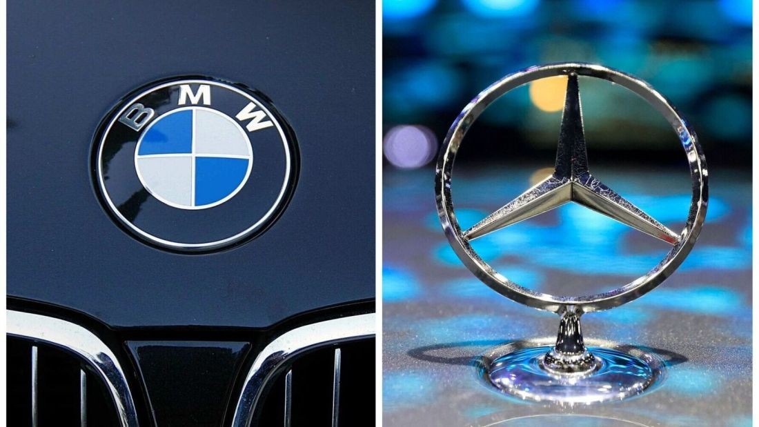 Mercedes-Benz and BMW logos side-by-side representing the brand comparison