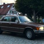 Side view of the classic Mercedes Benz 450 SEL 6.9 showcasing its elegant lines and design