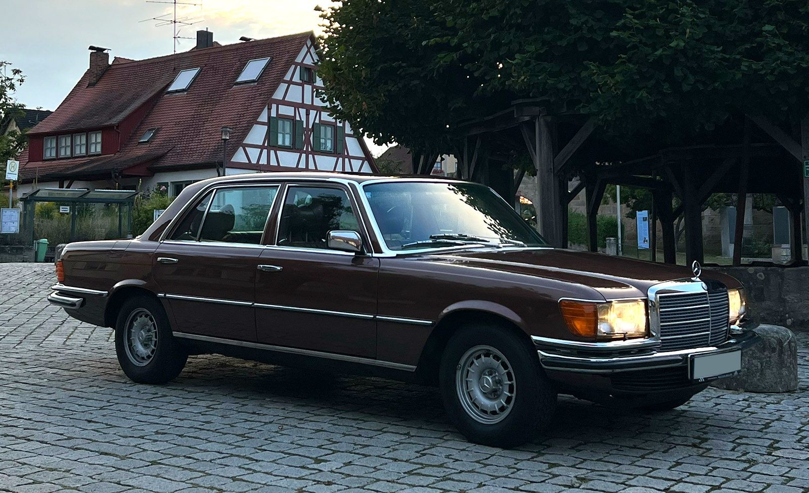 Side view of the classic Mercedes Benz 450 SEL 6.9 showcasing its elegant lines and design