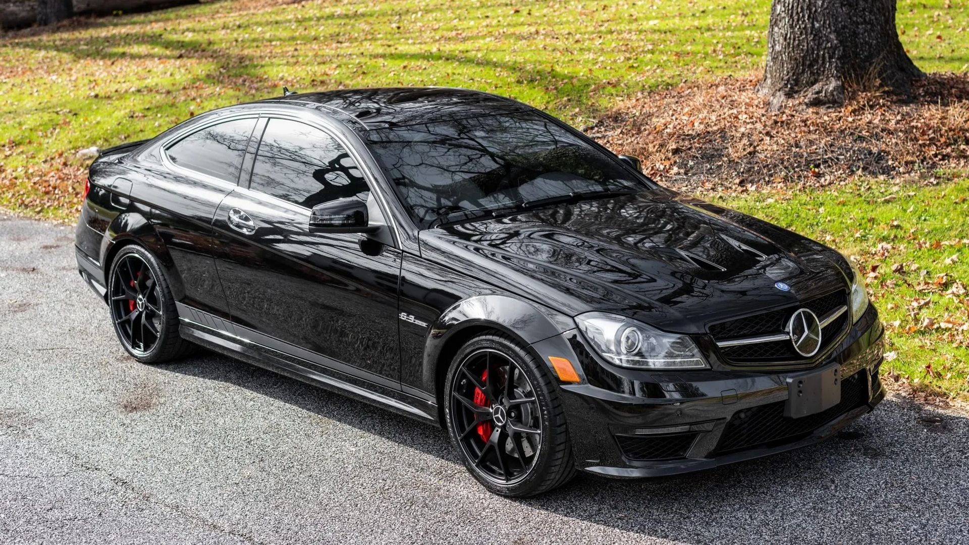 Black 2014 Mercedes-Benz C63 AMG coupe front view