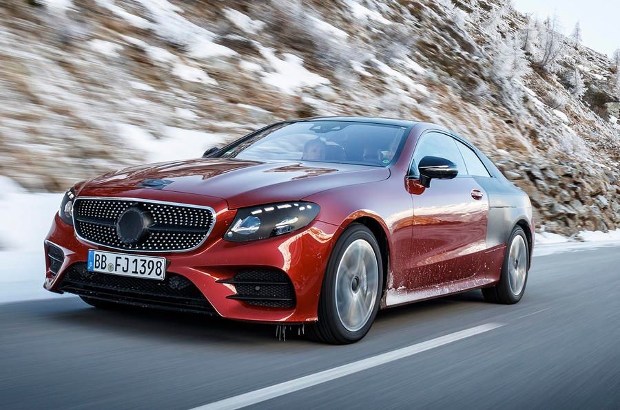 Side view of a 2017 Mercedes-Benz E-Class Coupe, highlighting its sleek coupe silhouette and luxurious design details.