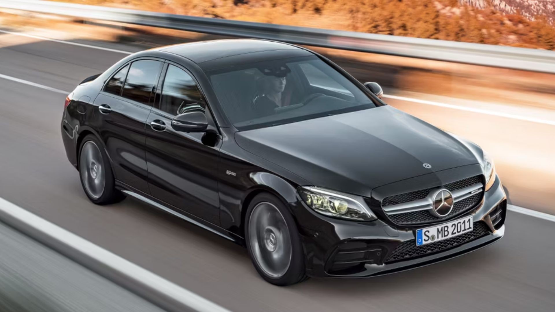 Black 2021 Mercedes-AMG C43 sedan front angle