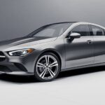 Front quarter view of a gray 2023 Mercedes-Benz CLA-Class coupe showcasing its sleek design and premium appeal.