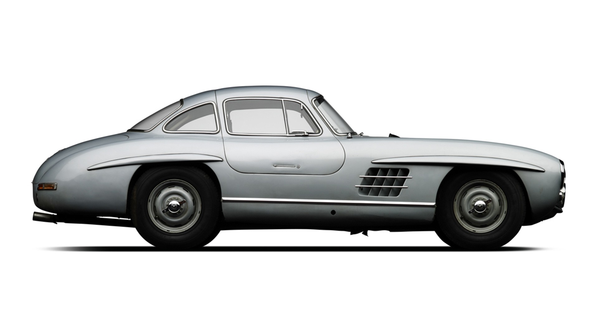 1955 Mercedes-Benz 300 SL Gullwing with Rudge wheels, highlighting its classic design, for sale in 1970