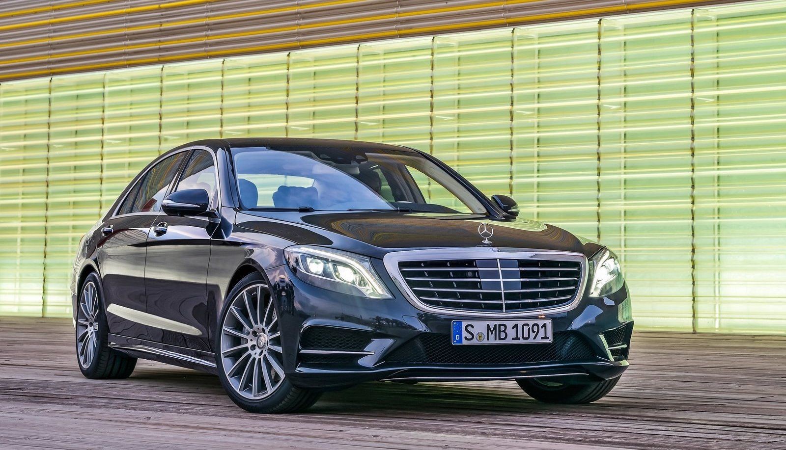 A black 2014 Mercedes-Benz S-Class sedan, showcasing its iconic design and commanding presence as the pinnacle of Mercedes-Benz luxury.